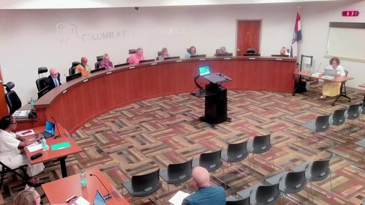 CPS School Board Members at the dais in front of audience members at the August 10, 2026, meeting.